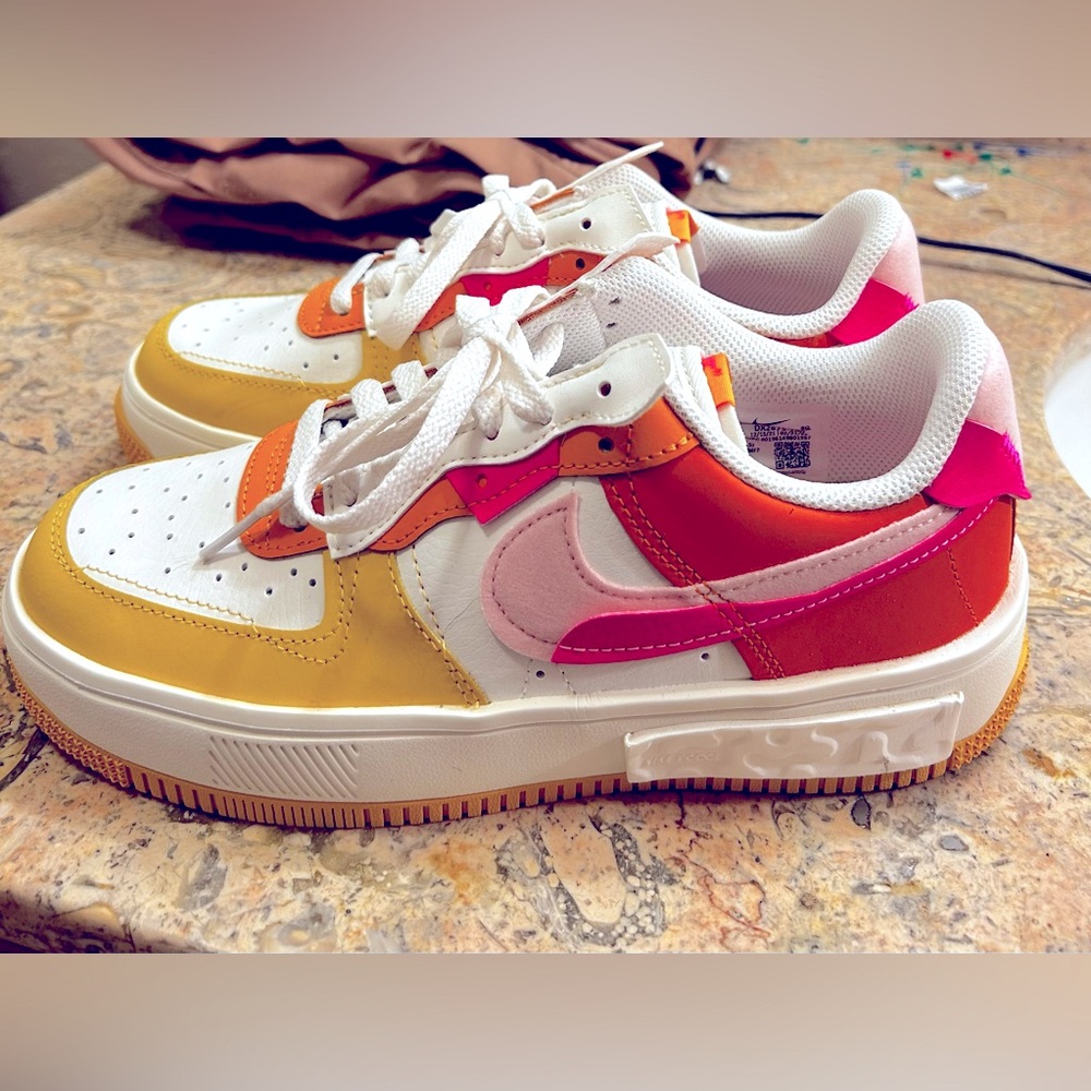 Nike Air Force 1 Women’s size 7.5. Never worn. Multicolored.